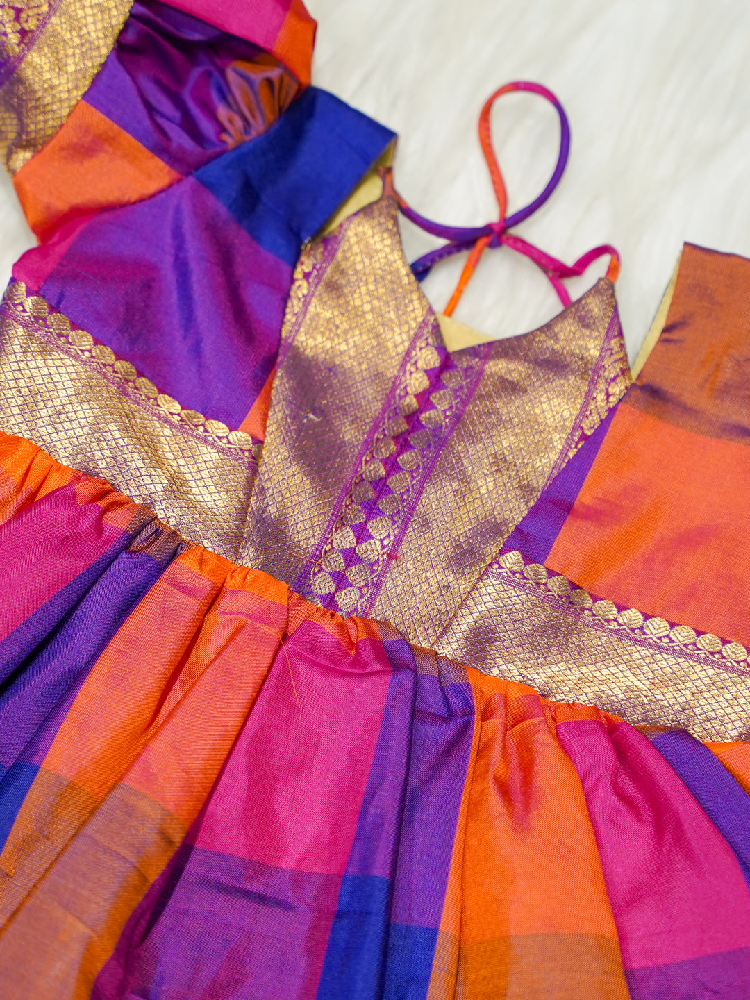 Multicolour Silk Baby Girl Gown with Purple & Gold Zari Border