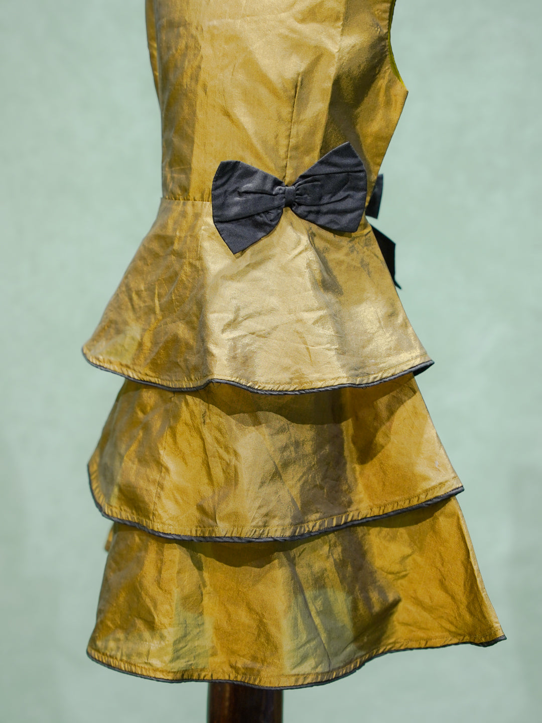 Gold Tiered Silk Gown with Black Bow