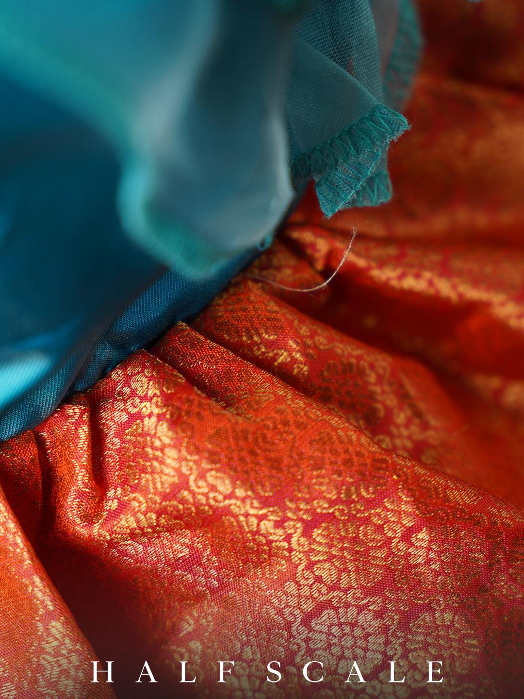 Turquoise Blue and Reddish-Orange Floral Sleeves Kanjivaram Silk Gown Silk Gown Half Scale