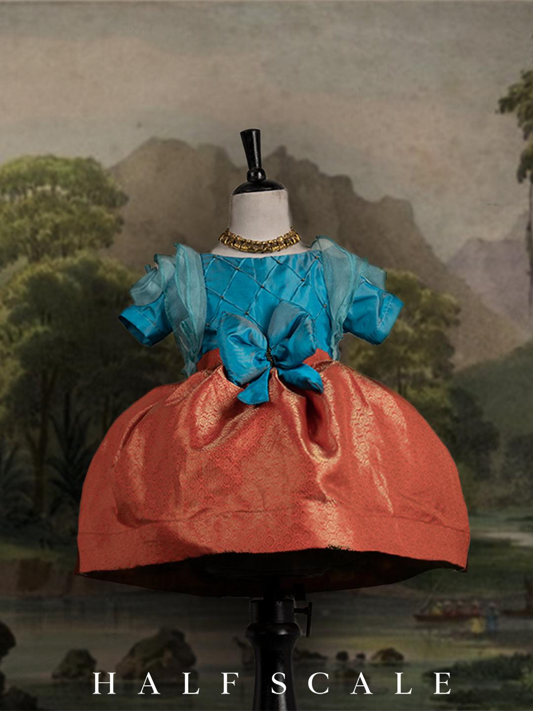 Turquoise Blue and Reddish-Orange Floral Sleeves Kanjivaram Silk Gown Silk Gown Half Scale